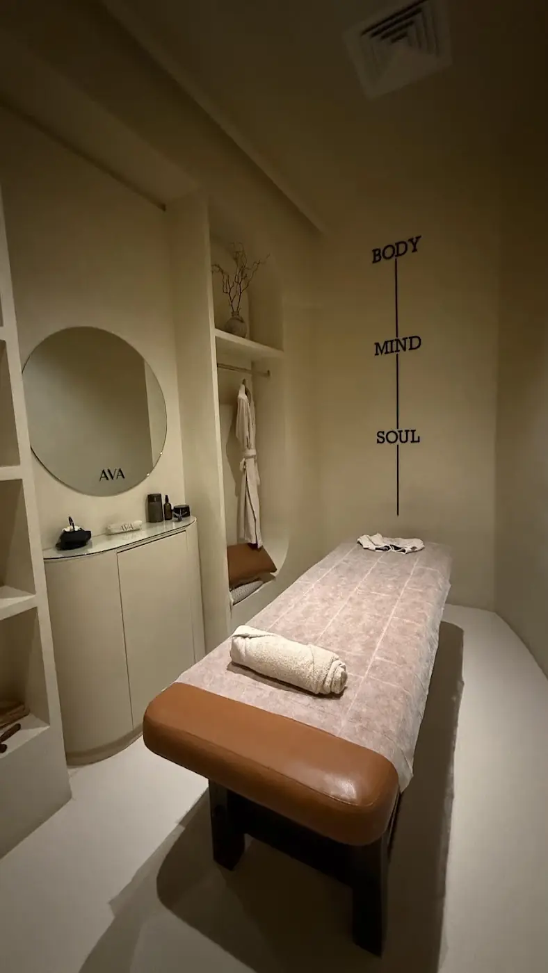 A softly lit treatment room at AVA